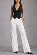 Look indossato (esterno): Gilet nero donna con scollo a V abbinato a pantaloni bianchi a gamba larga – look street style