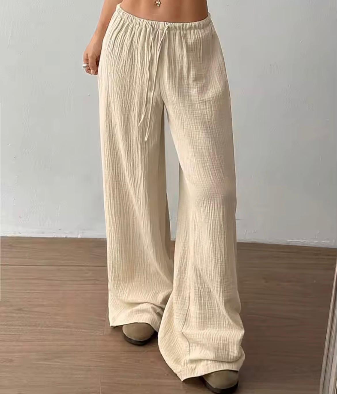 Pantalone largo donna tessuto crinkle beige, vita elastica con coulisse, fit palazzo