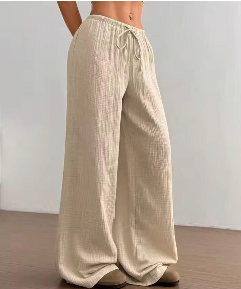 Pantalone largo donna tessuto crinkle beige, vita elastica con coulisse, fit palazzo