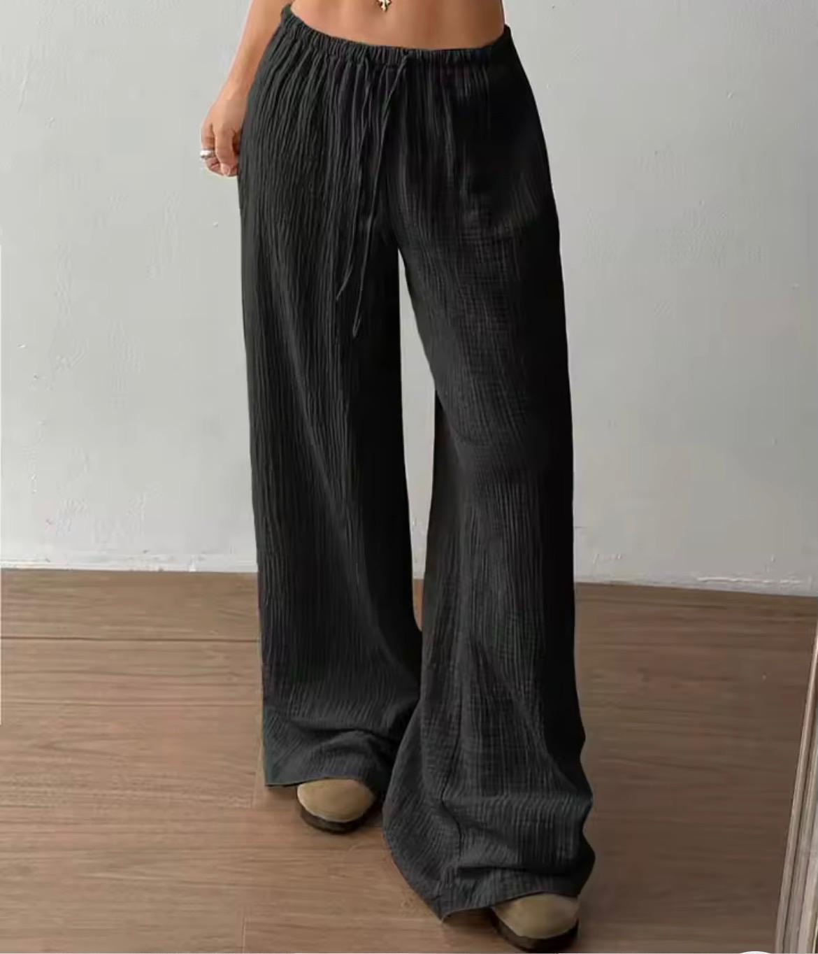 Pantalone largo donna tessuto crinkle nero, vita elastica con coulisse