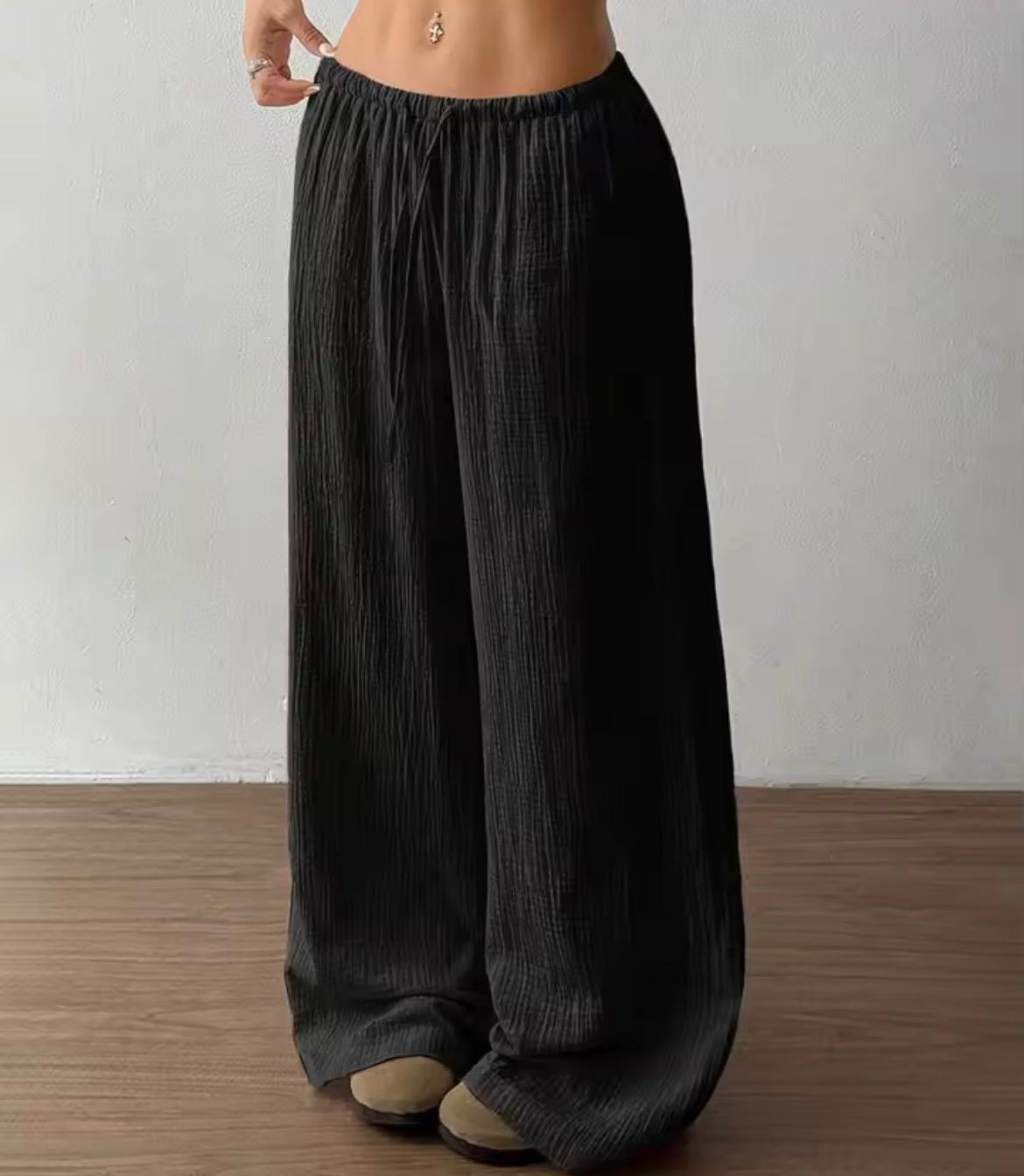 Pantalone largo donna tessuto crinkle nero, vita elastica con coulisse
