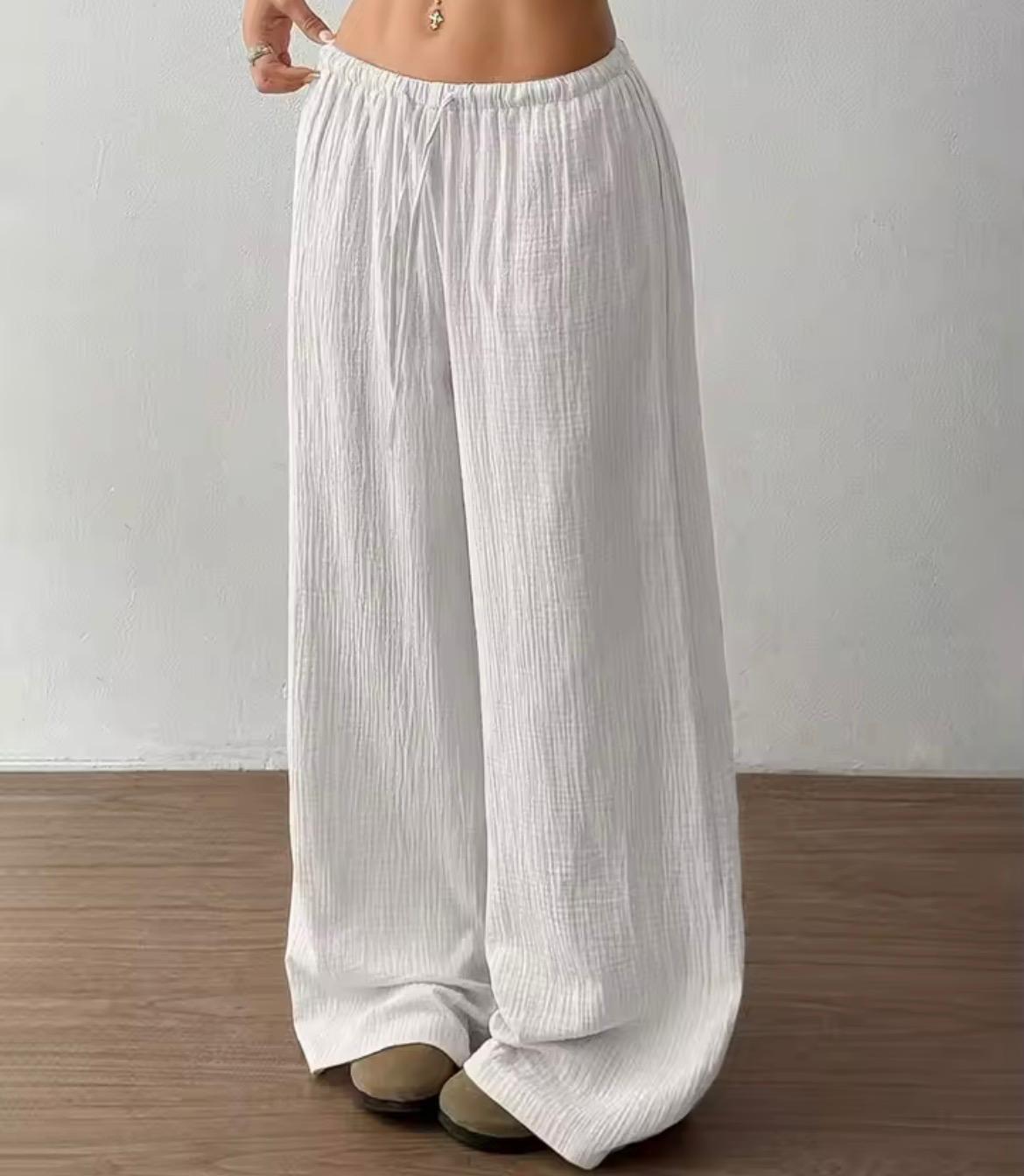 Pantalone largo donna tessuto crinkle bianco, vita elastica con coulisse
