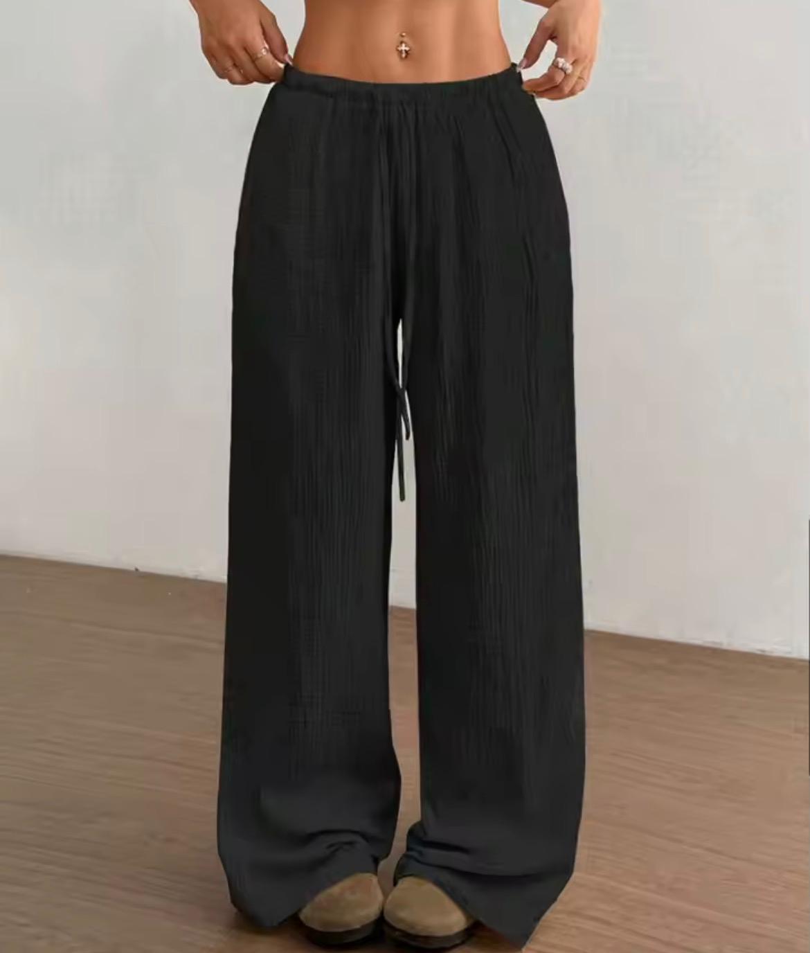 Pantalone largo donna tessuto crinkle nero, vita elastica con coulisse